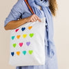 Peace of Mind White cotton shopper bag with rainbow handles and multi coloured hearts